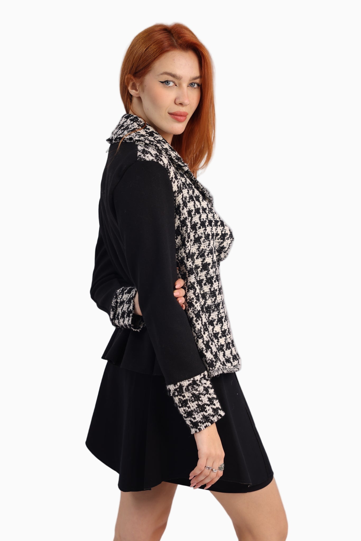 Woman wearing a Siste’s Pull Jacket black & white houndstooth jacket - Side View