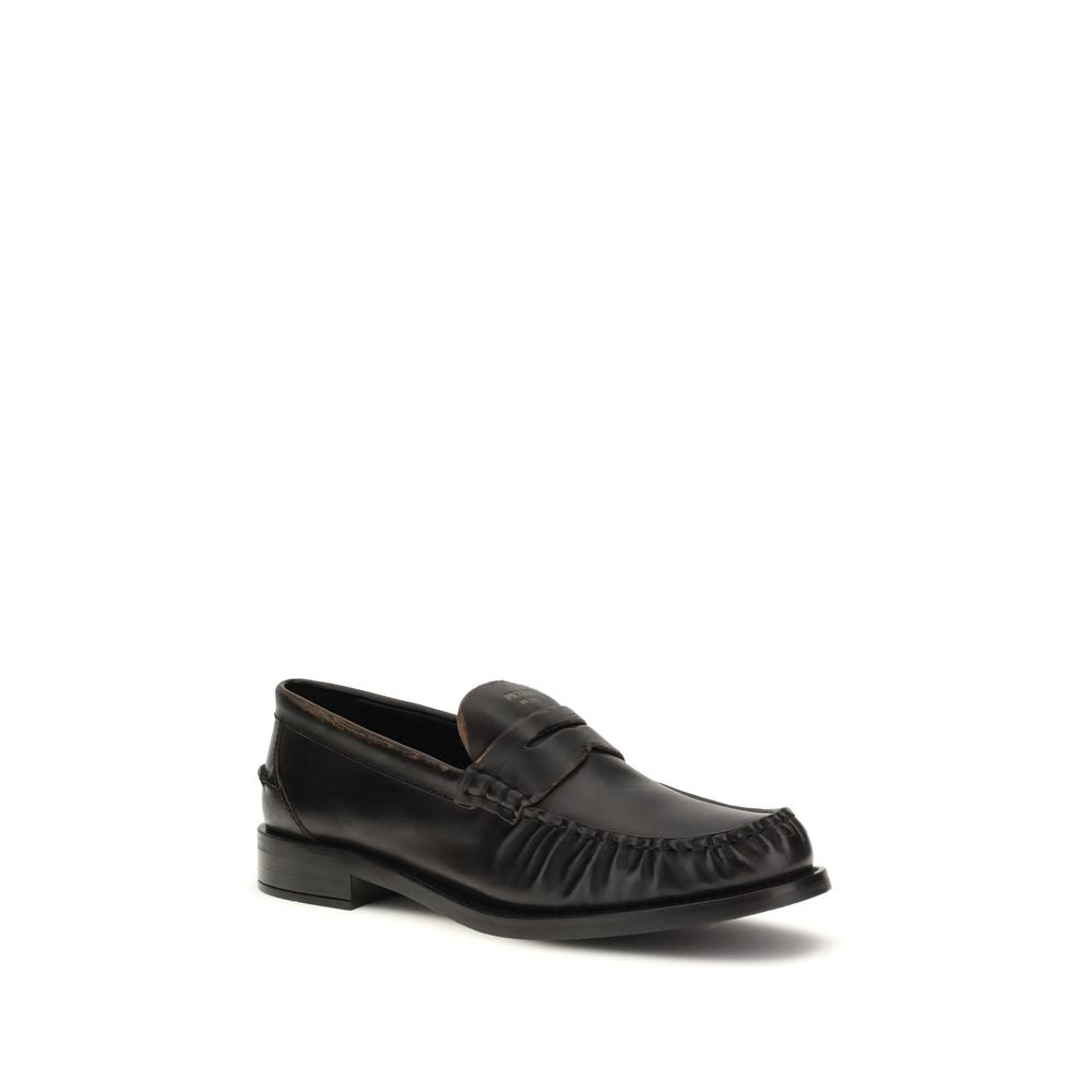 Prada Black Calf Leather Bos Taurus Slip-On Loafers - Luxe Marca