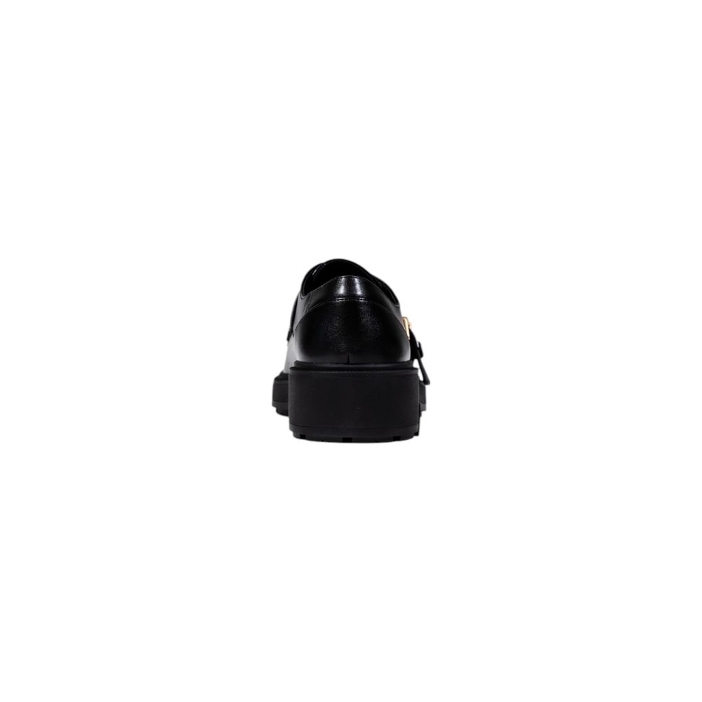 حذاء ليو جو بكعب بلاتفورم من الجلد الصناعي الأسود