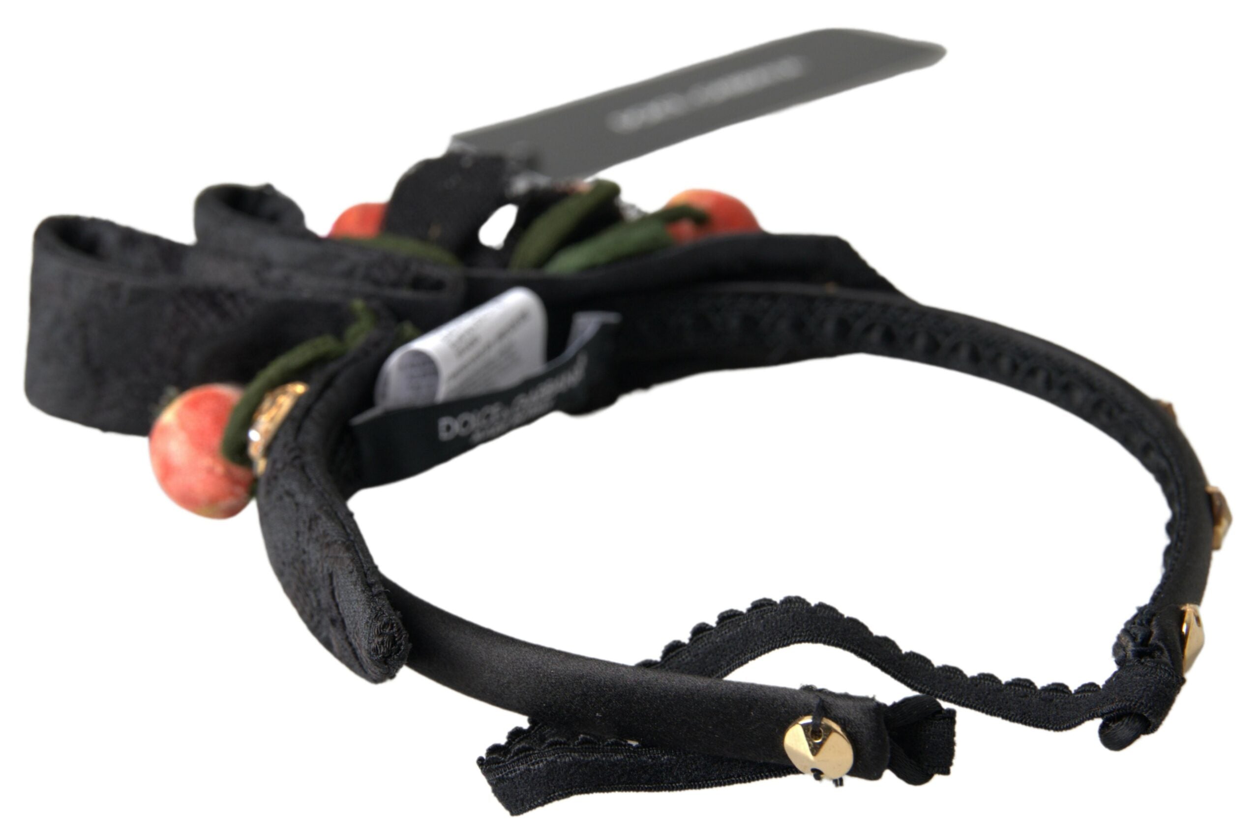 عصابة رأس من دولتشي آند غابانا باللون الأسود مع تاج كريستالي متعدد الألوان على شكل فاكهة التين