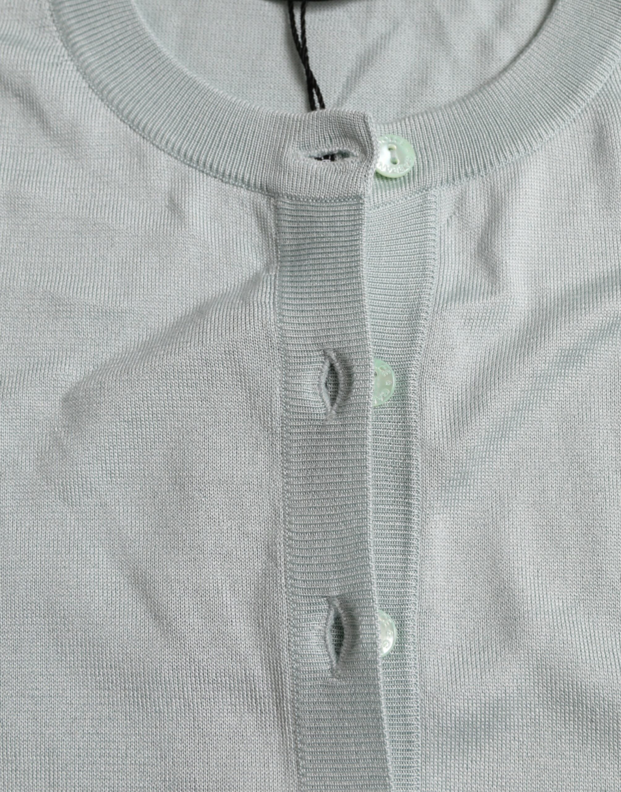 سترة كارديجان من دولتشي آند غابانا باللون الأزرق الفاتح من الحرير بياقة دائرية