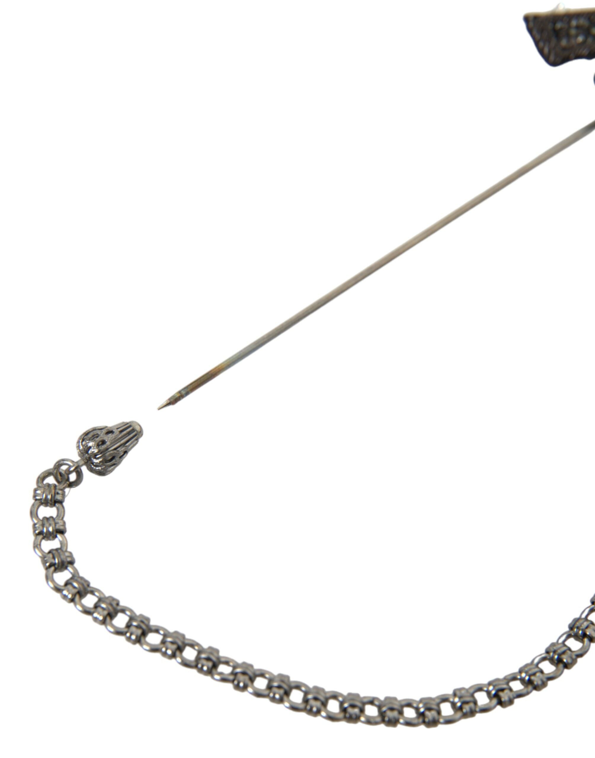 دبوس بروش رجالي من دولتشي آند غابانا بتصميم مسدس من النحاس والحرير