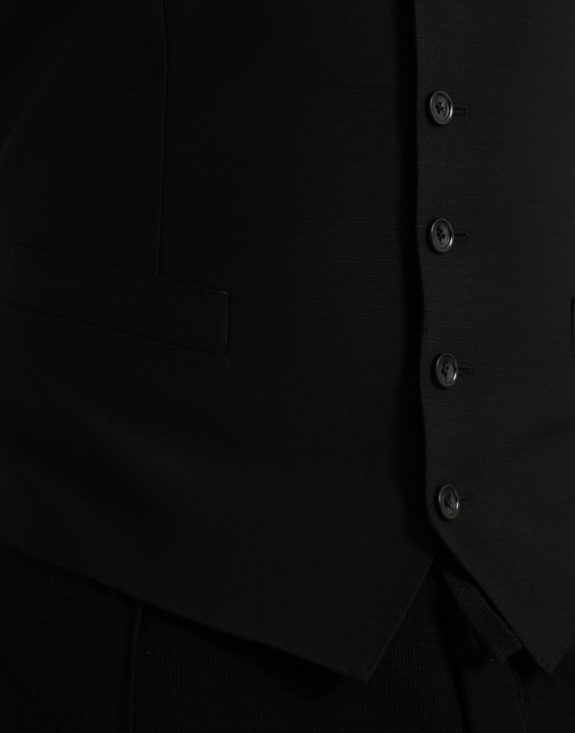 فستان دولتشي آند غابانا أسود من الصوف مع صدرية رسمية