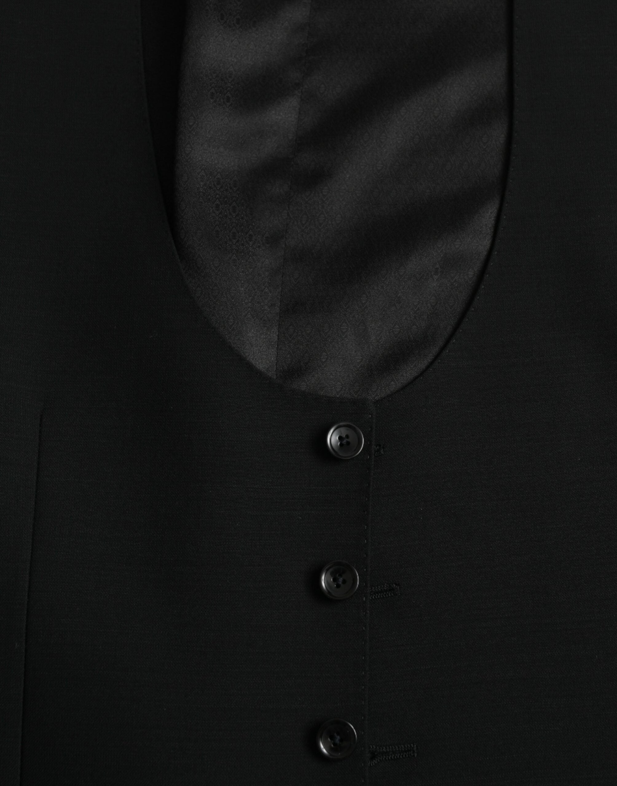 فستان دولتشي آند غابانا أسود من الصوف مع صدرية رسمية