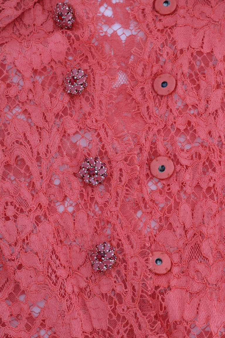 بلوزة دولتشي آند غابانا من الدانتيل المزهر بأزرار كريستالية برتقالية