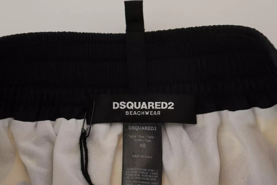 شورت سباحة من النايلون مطبوع باللونين الأصفر والأسود من Dsquared²
