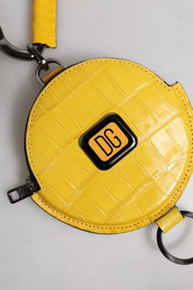 محفظة نقود معدنية دائرية من الجلد الأصفر بشعار DG من دولتشي آند غابانا