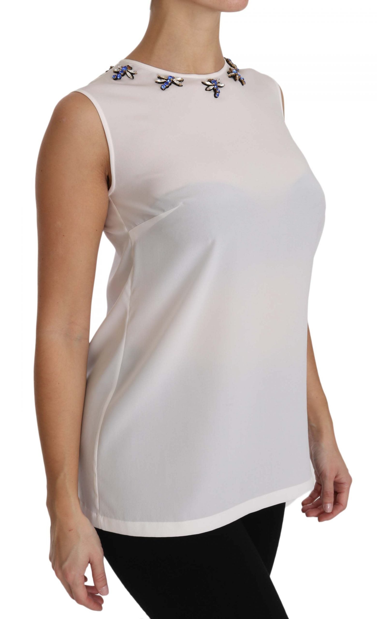 بلوزة دولتشي آند غابانا المصنوعة من الحرير الأبيض والمزينة بالكريستال على شكل يعسوب