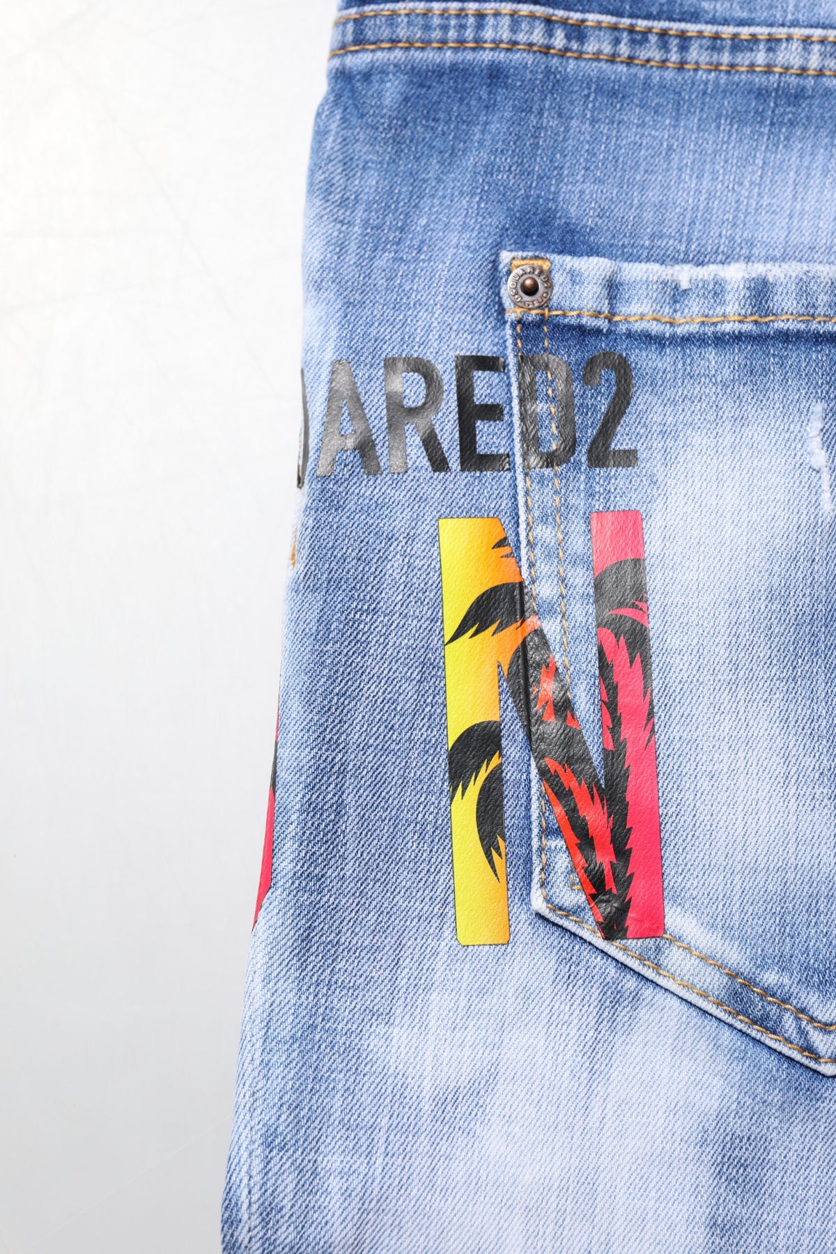 بنطلون جينز ضيق متوسط الخصر من القطن المغسول باللون الأزرق من Dsquared²