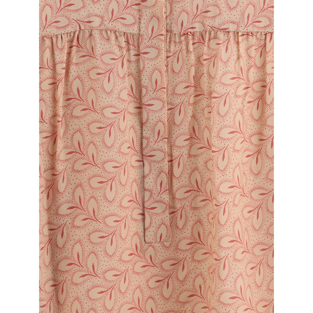 بلوزة كريستينا تي بطبعة أوراق الشجر وياقة واقفة أنيقة