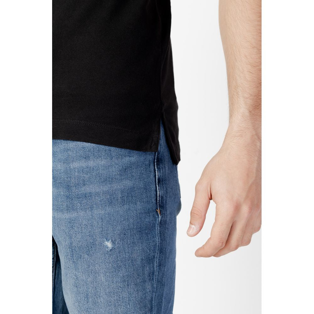 قميص بولو قطني أسود من تومي هيلفيغر جينز