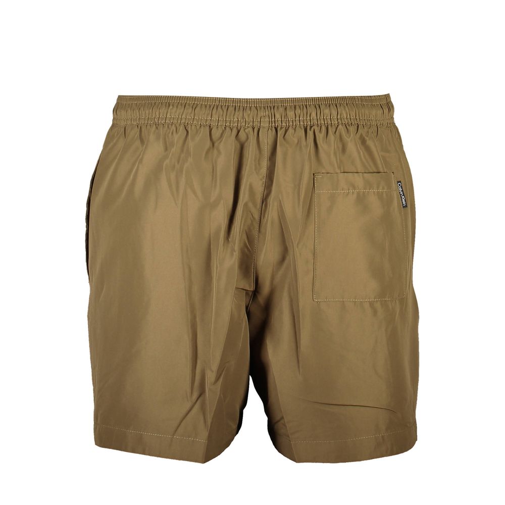 بوكسر سباحة رجالي من كالفن كلاين، لون بني داكن، مصنوع من البوليستر