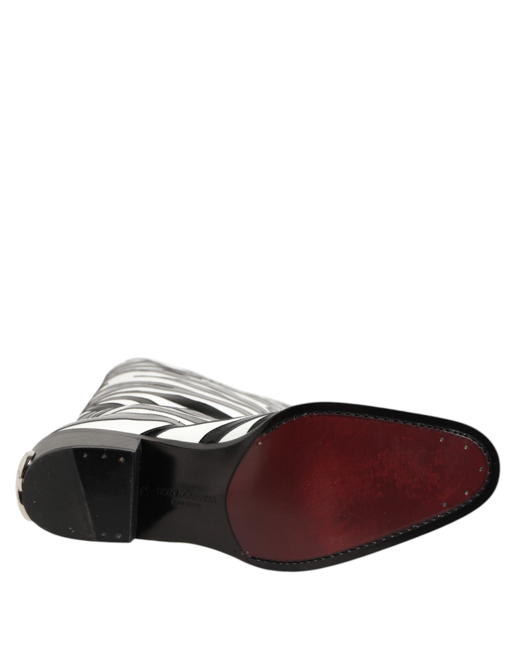 حذاء دولتشي آند غابانا أسود وأبيض بنقشة حمار وحشي فوق الساق