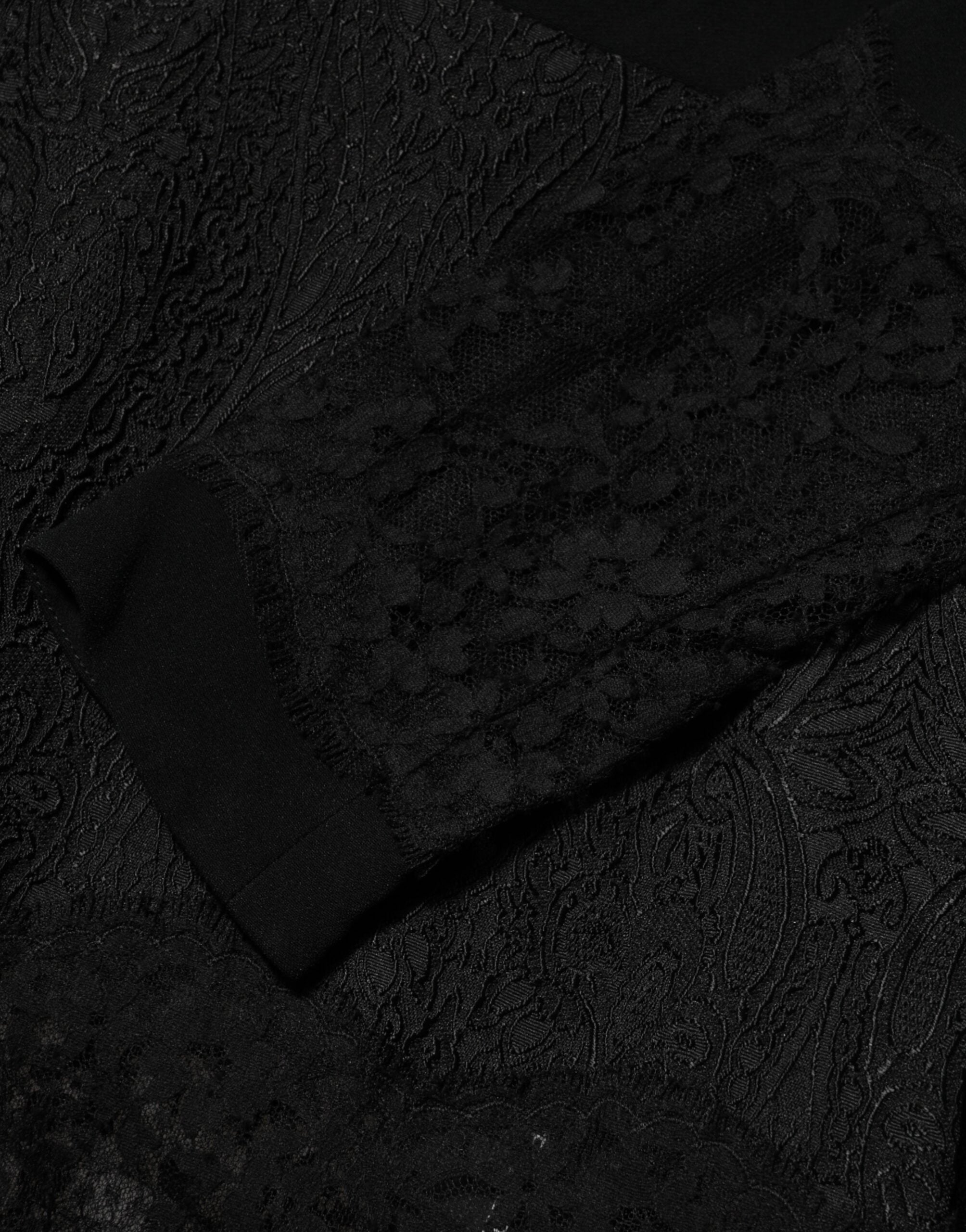 فستان دولتشي آند غابانا الأسود ذو التصميم A مع حواف من الدانتيل المزهر