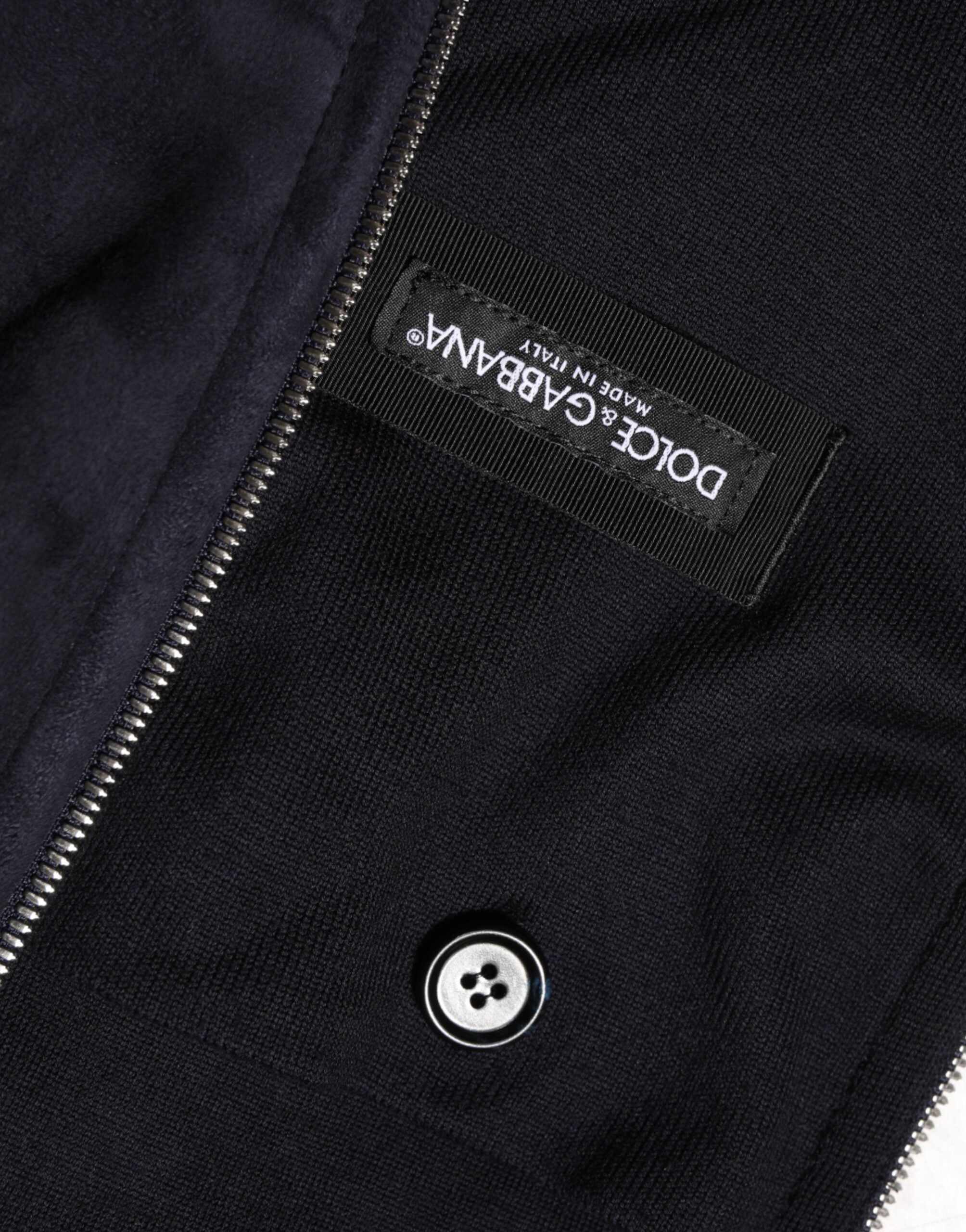 جاكيت دولتشي آند غابانا أسود من الجلد بسحاب كامل وغطاء رأس