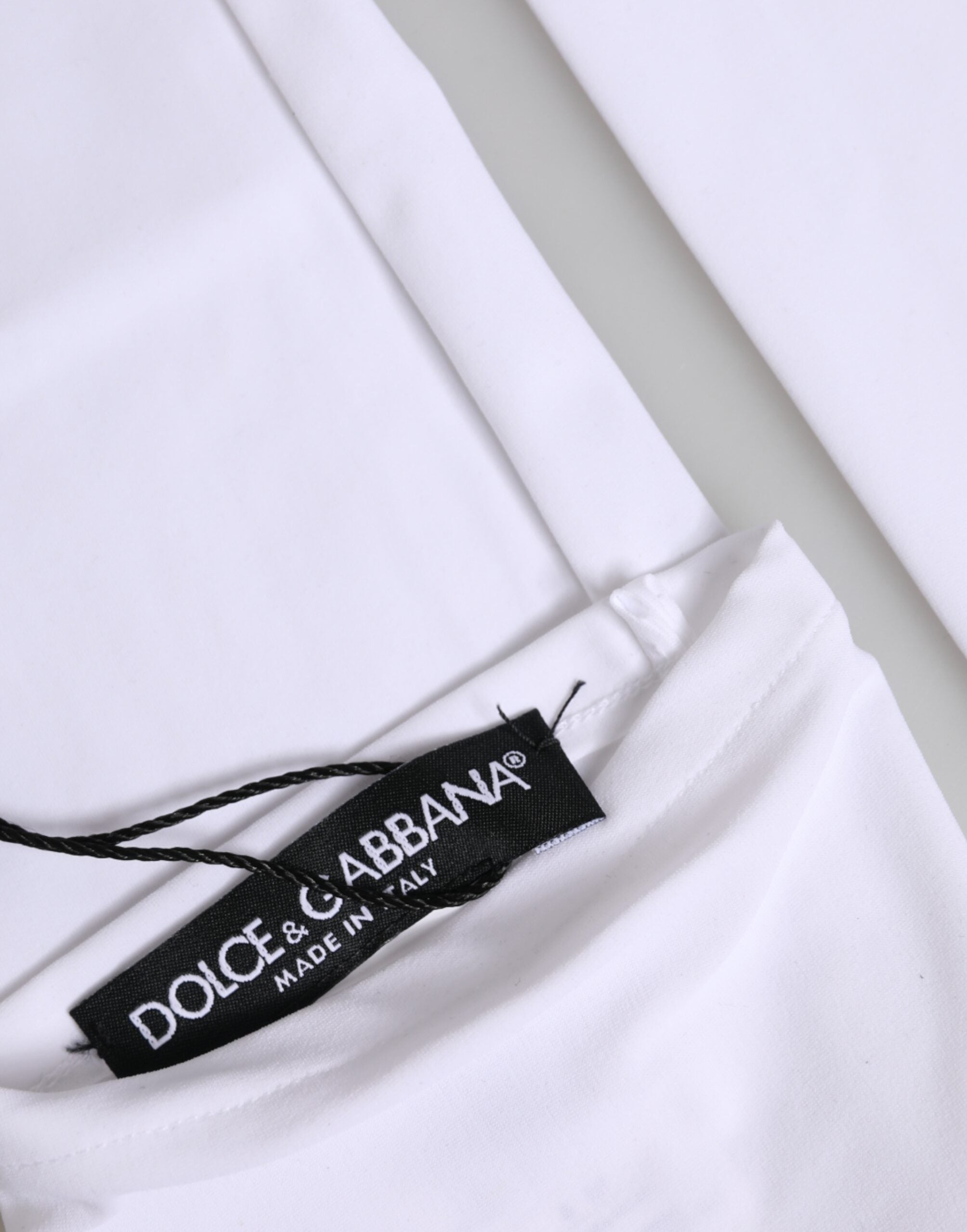 قفازات دولتشي آند غابانا بيضاء من النايلون بدون أصابع بطول الكوع