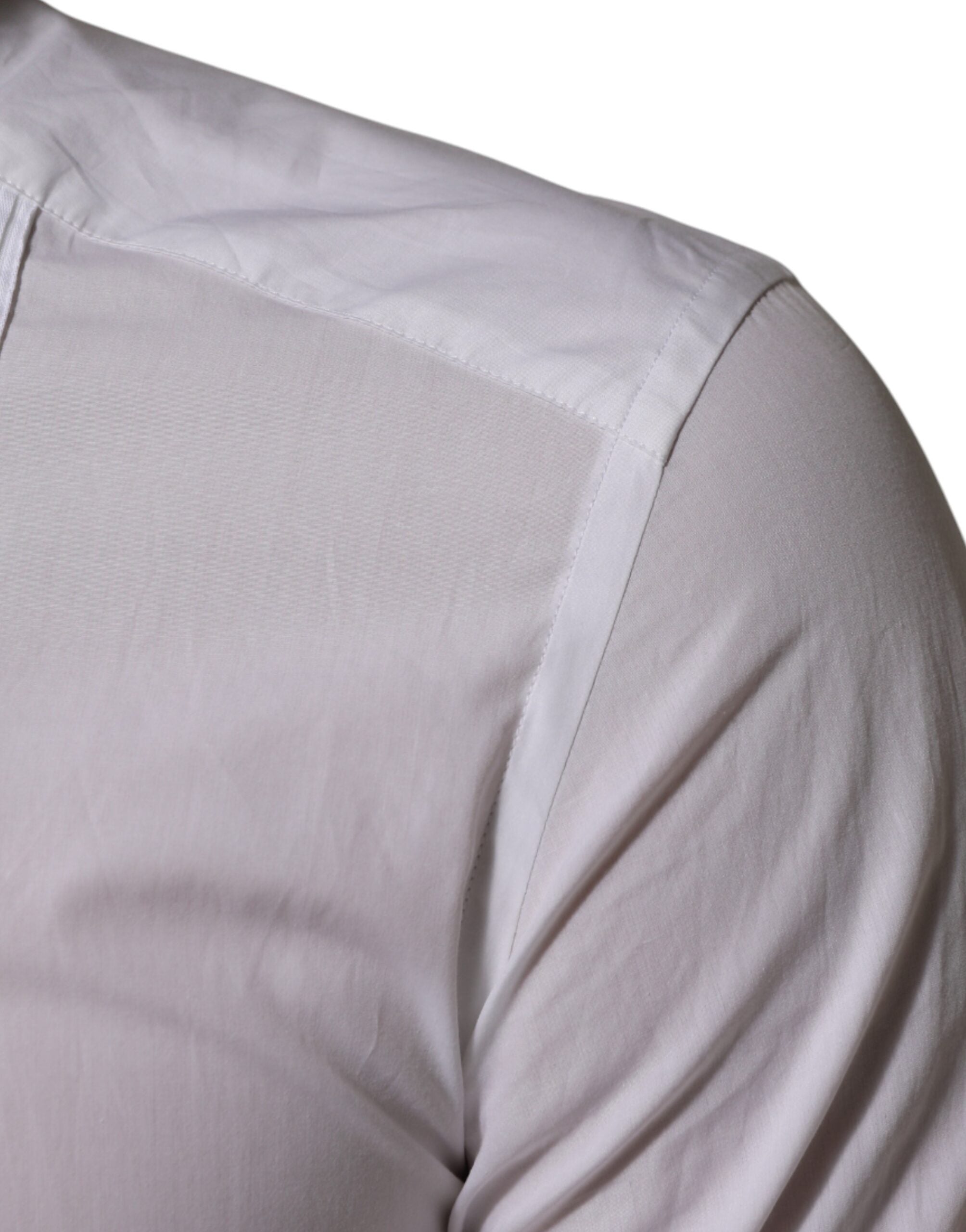 قميص دولتشي آند غابانا أبيض قطني بأكمام طويلة وياقة ذهبية