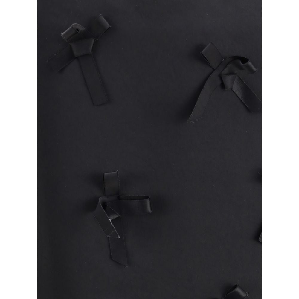 تنورة جيل ساندر متوسطة الطول من الأسيتات باللون الأسود