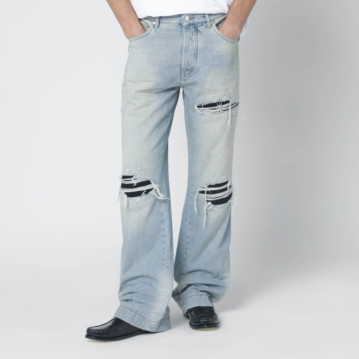 Amiri AMIRI Ripped jeans in Mist Indigo