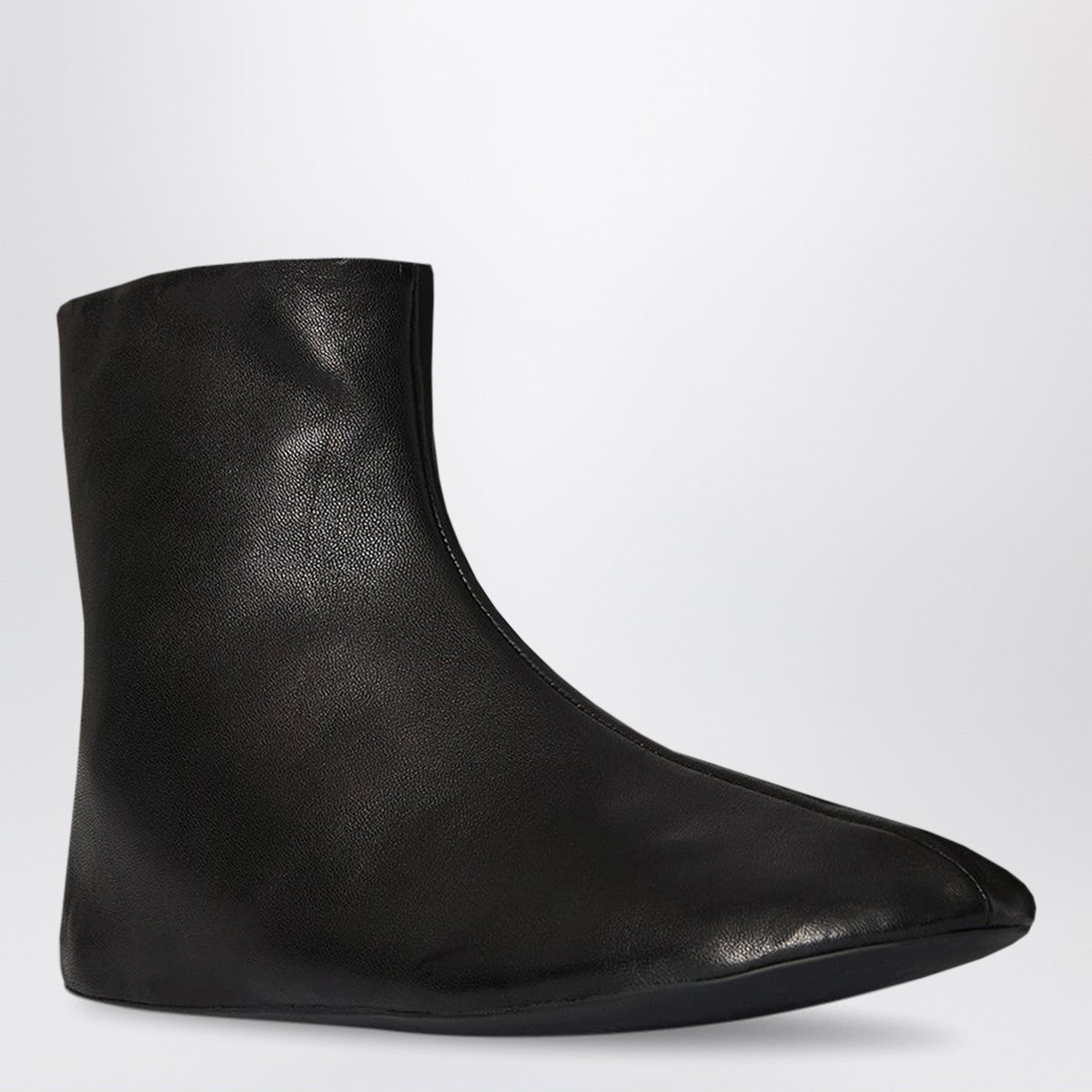 The Row Stella ankle boots black in leather and shearling