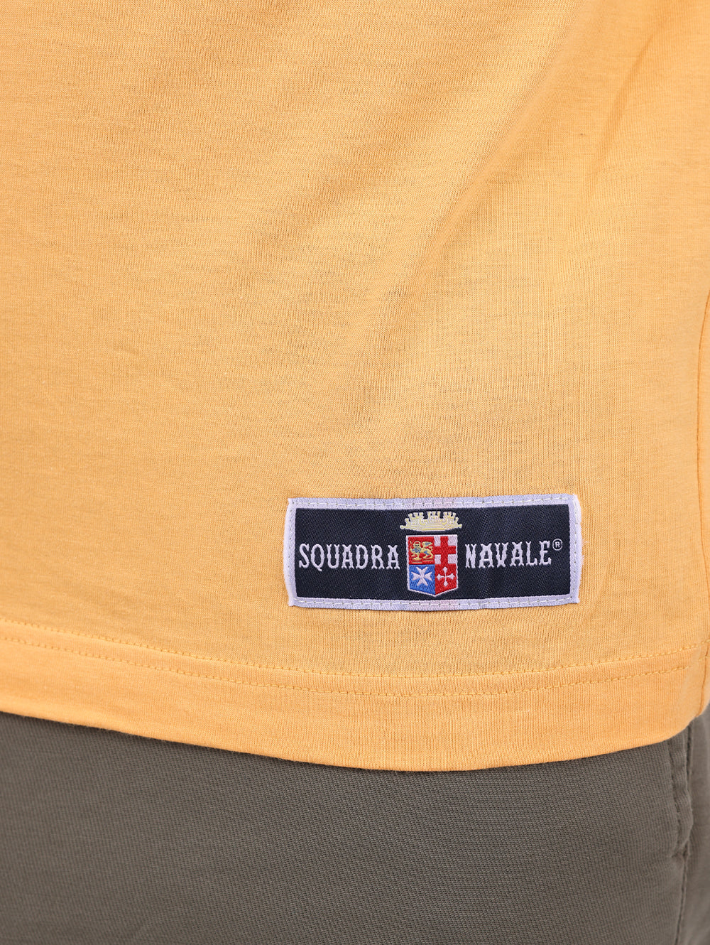 Close-up of Squadra Navale embroidered logo patch on Orange T-Shirt