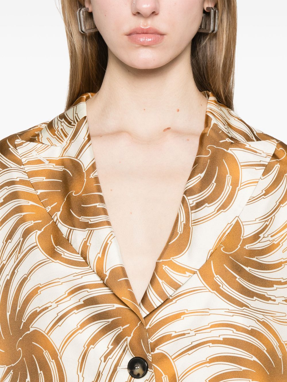 بليزر مطبوع برسومات من ألبرتو بياني