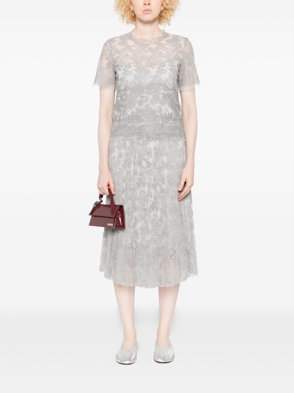 من تصميم Ermanno Scervino، بلوزة من تصميم Ermanno Scervino بأكمام قصيرة