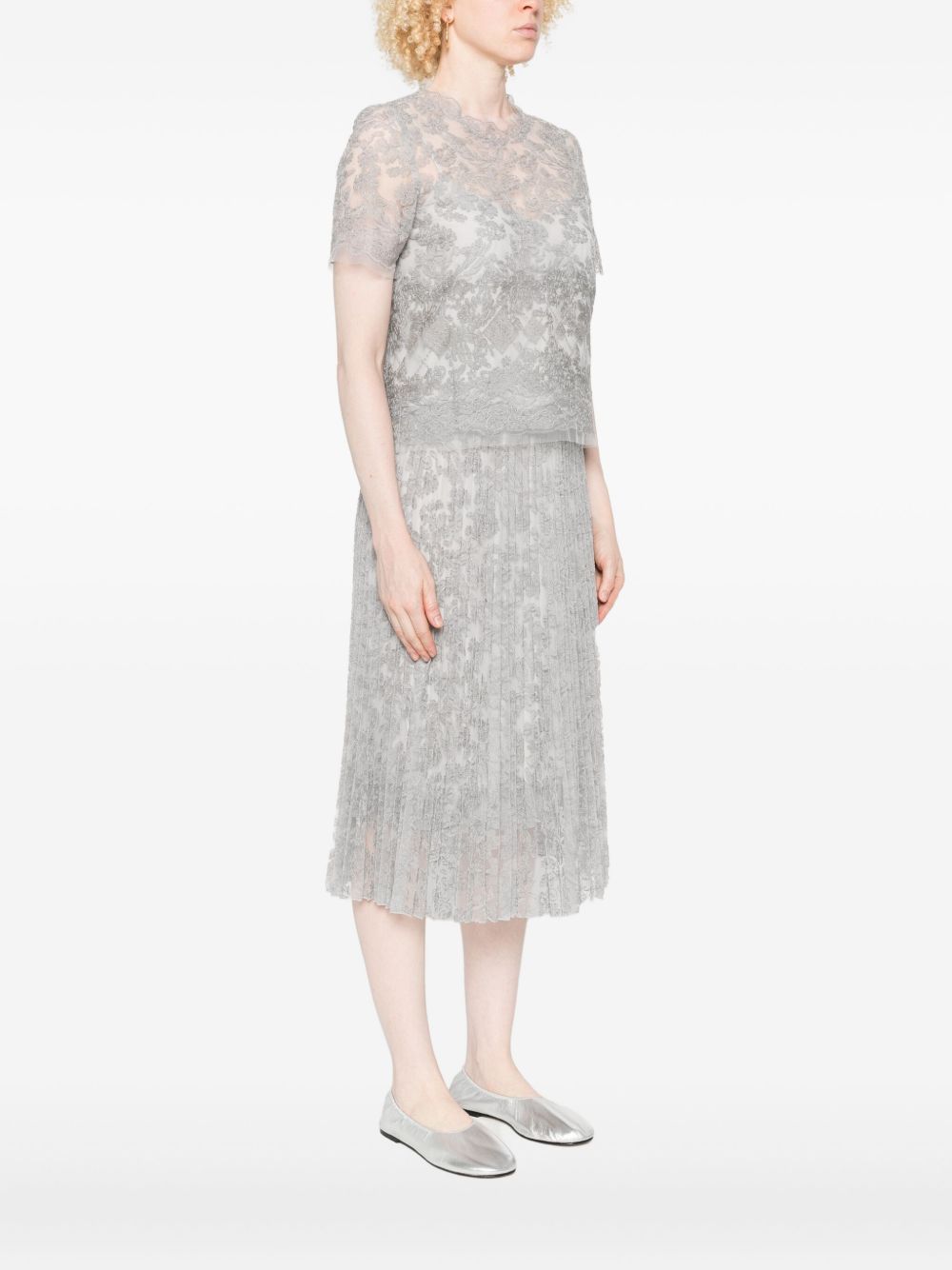 من تصميم Ermanno Scervino، بلوزة من تصميم Ermanno Scervino بأكمام قصيرة