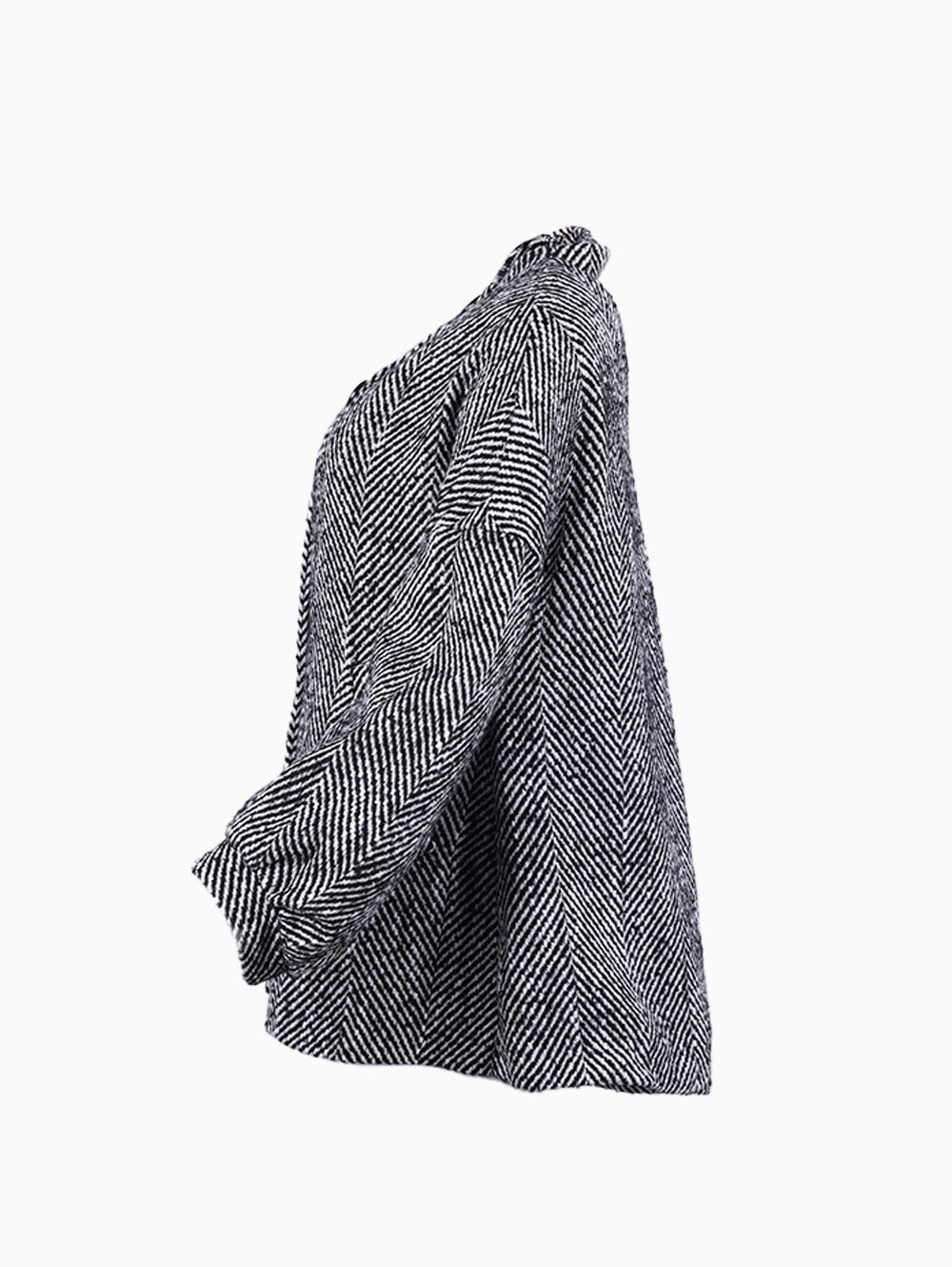 Siste’s Torn Coat side profile showing oversized relaxed silhouette – Luxe Marca