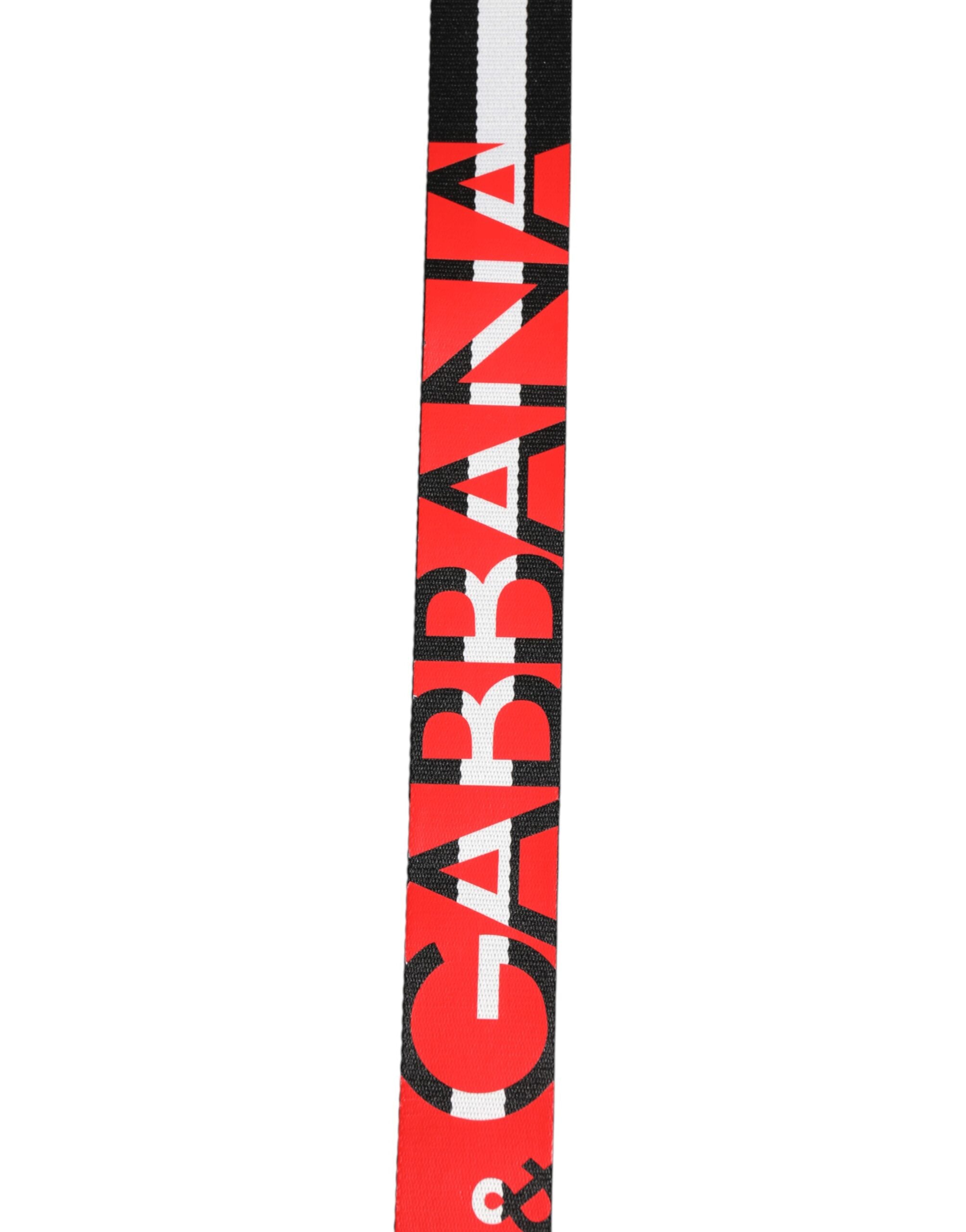 حزام دولتشي آند غابانا الأسود والأبيض المخطط بشعار معدني