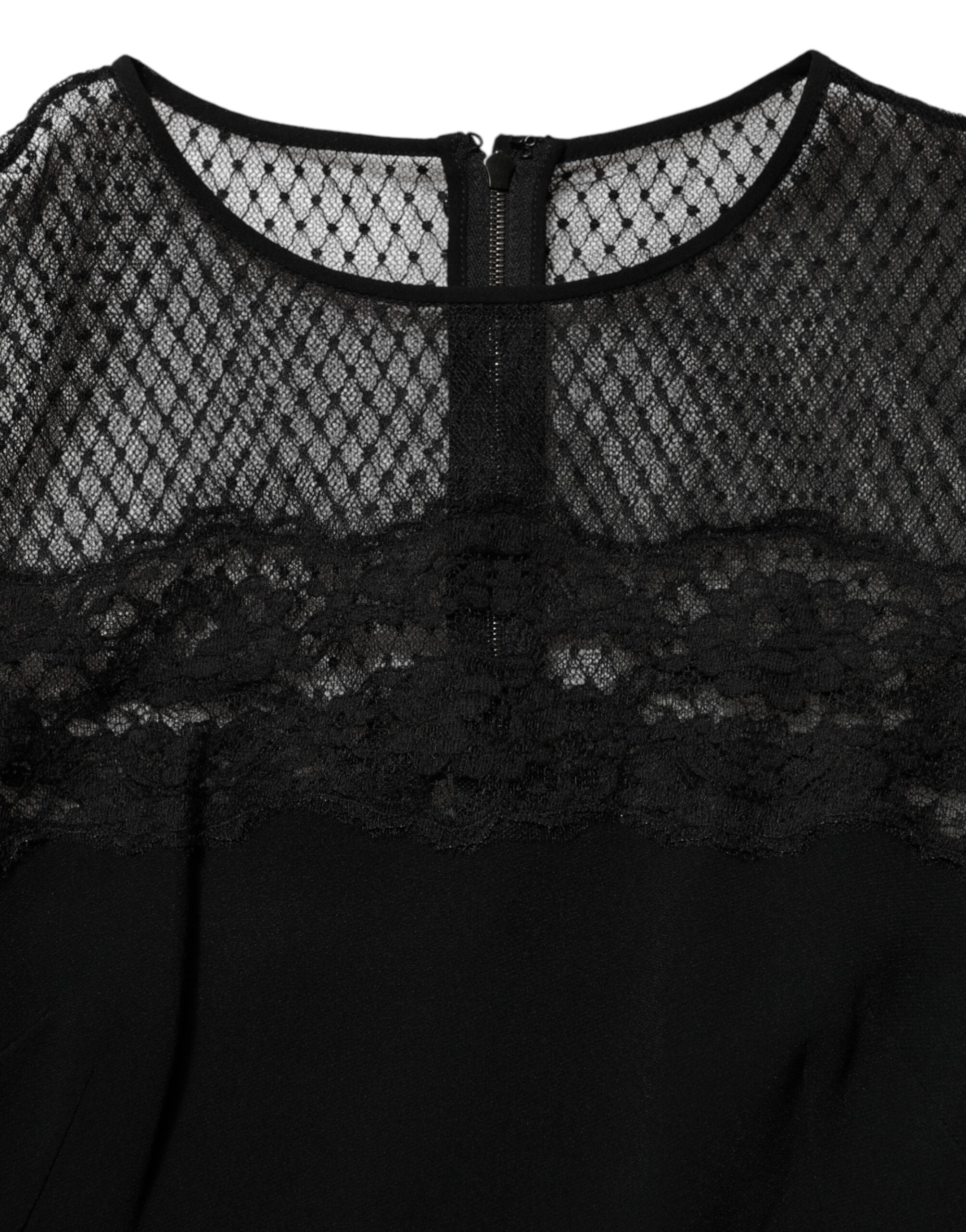 فستان دولتشي آند غابانا الأسود ذو التصميم A مع حواف من الدانتيل المزهر