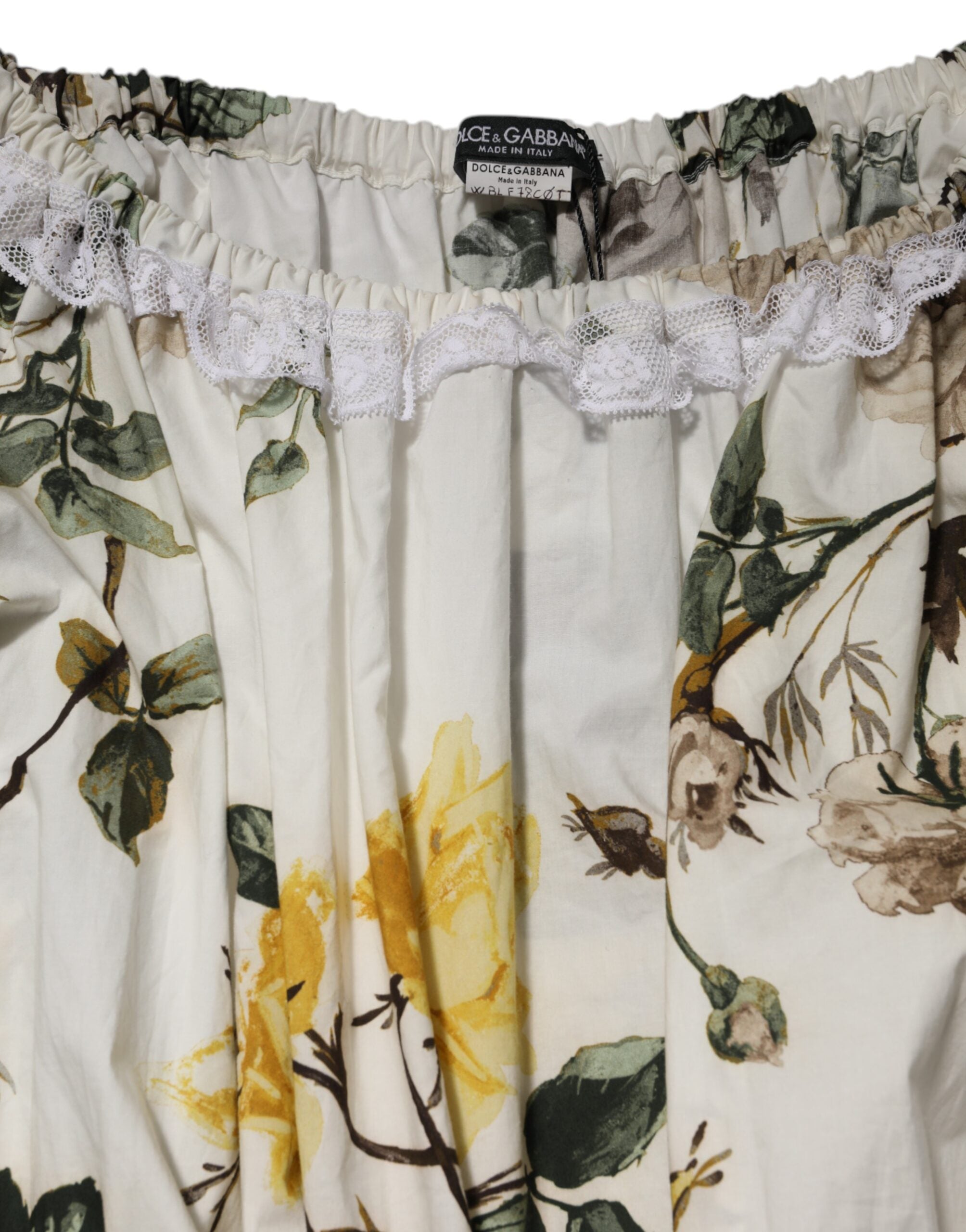 فستان دولتشي آند غابانا الأبيض المزهر من الدانتيل مكشوف الكتفين