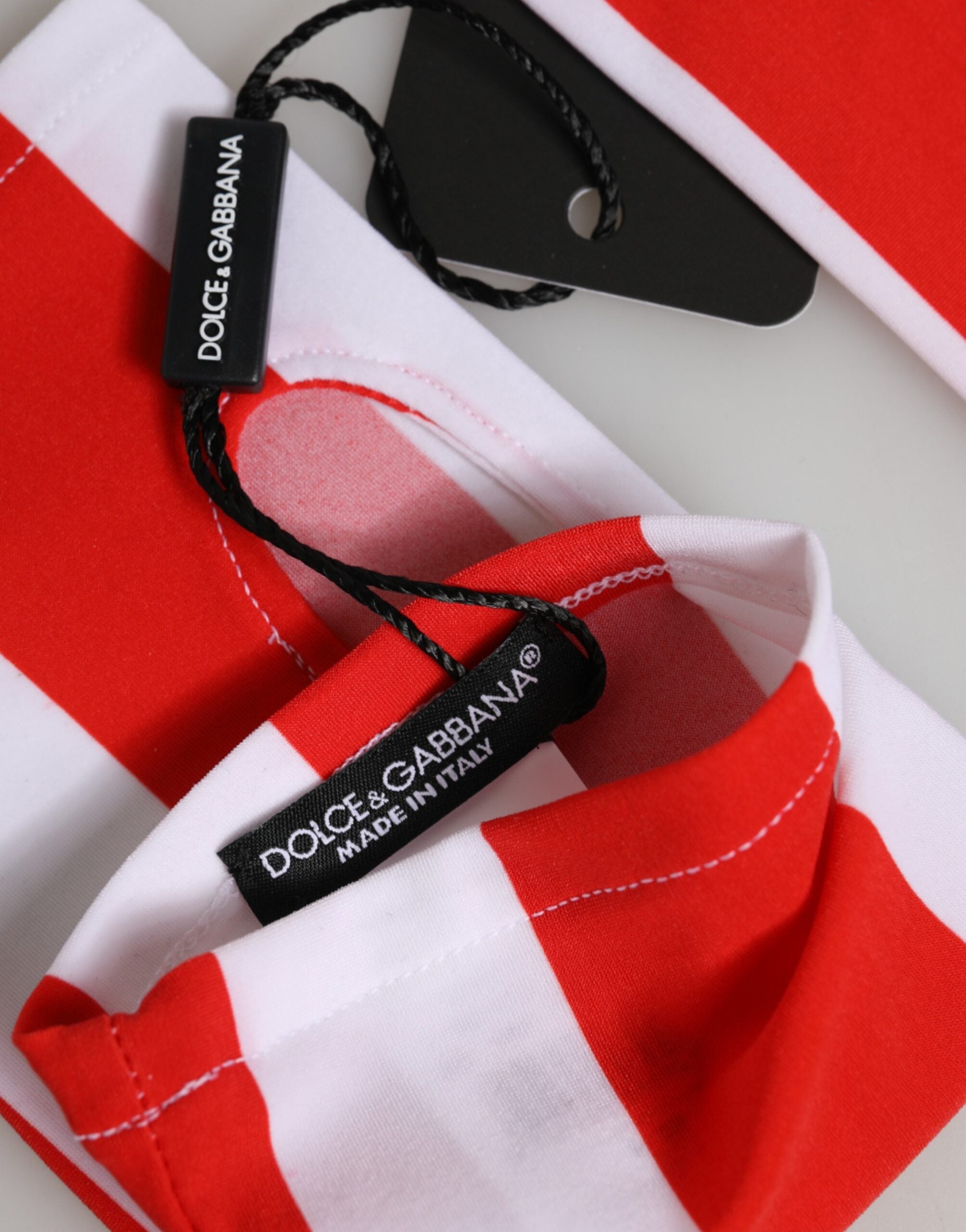 قفازات دولتشي آند غابانا نايلون حمراء بيضاء بدون أصابع بطول المعصم