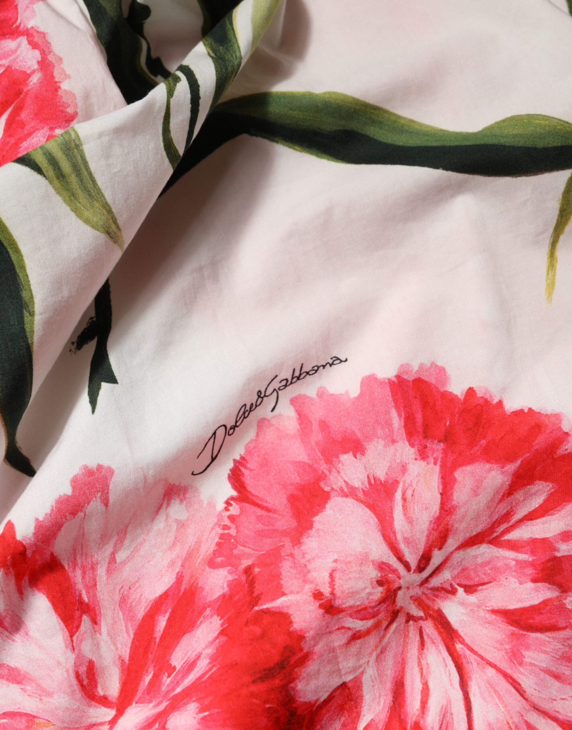 بلوزة دولتشي آند غابانا متعددة الألوان مزينة بالزهور مكشوفة الكتفين