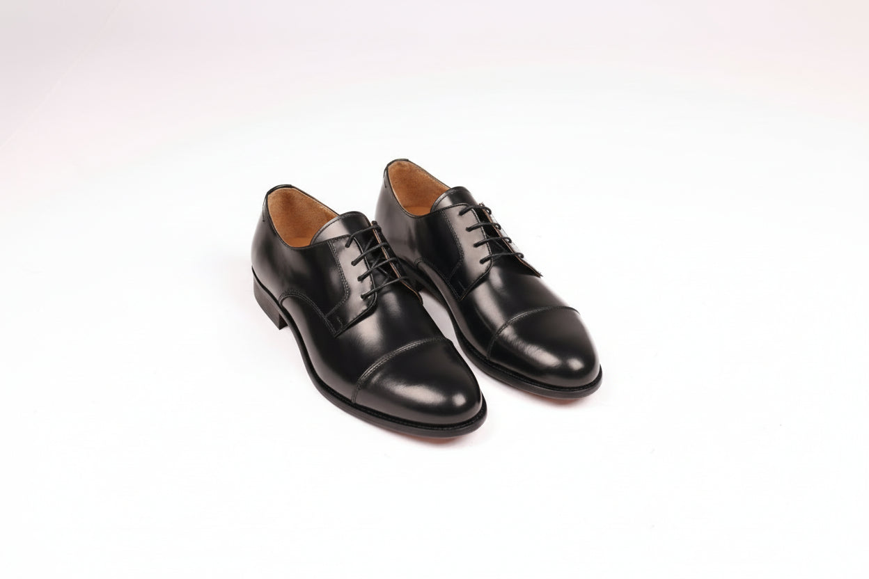 Top view of Bardigiani black leather Derby shoes made in Italy.